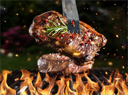 دانلود عکس با کیفیت از گوشت سوخاری در حال گریل شدن روی آتش