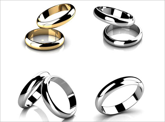 عکس با کیفیت از حلقه های ازدواج نقره ای و طلایی با بکگراندسفید