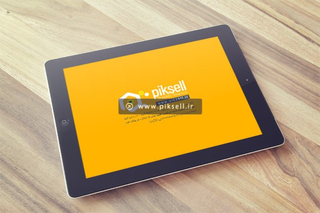 دانلود فایل psd لایه باز موکاپ یا پیش نمایش تبلت روی میز چوبی