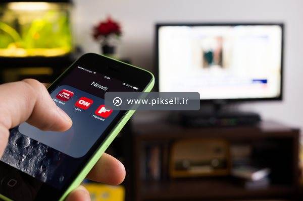عکس با کیفیت از کنترل تلویزیون با تلفن همراه با موبایل