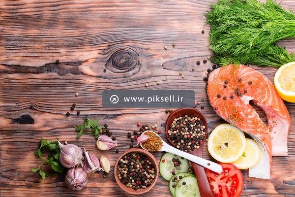 عکس با کیفیت از بکگراند با حشیه ی فیله ماهی و سبزیجات