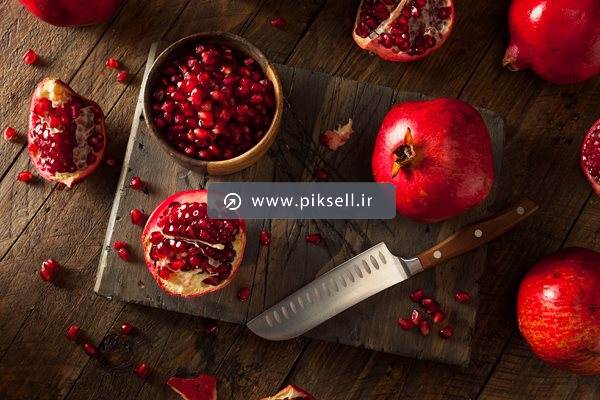 عکس با کیفیت از برش دادن انار
