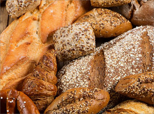 عکس با کیفیت از نان های باگت با کنجد