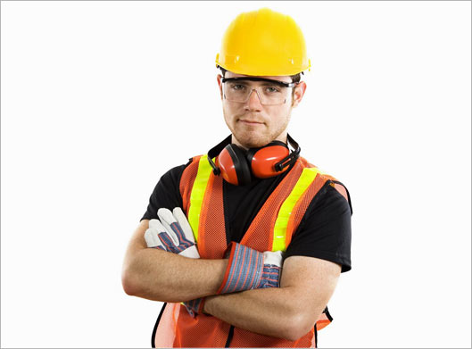 عکس با کیفیت از کارگر ساختمان و ایمنی با هدفون ضد صدا