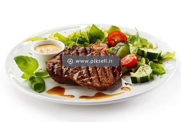 عکس با کیفیت از خوراک استیک گوشت و سبزیجات