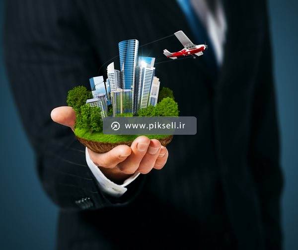 عکس با کیفیت از ماکت سه بعدی ساختمان بلند ، چمن و درخت در دست