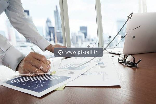 دانلود عکس با کیفیت از مهندس آمار و کاغذهای بررسی نمودارهای آماری و بورس
