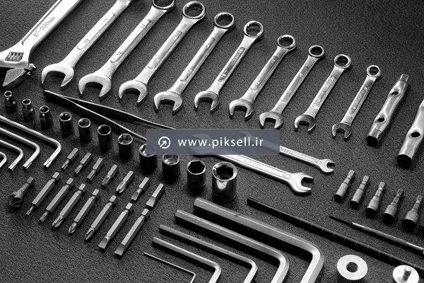 تصویر با کیفیت از مجموعه ابزارهای تعمیری شامل آچار ، آچار آلن و پیچ و مهره