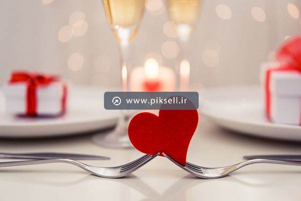 عکس با کیفیت از دو چنگال و قلب عاشق