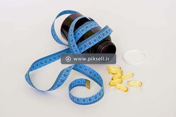 دانلود عکس با کیفیت از کپسول های لاغری و متر